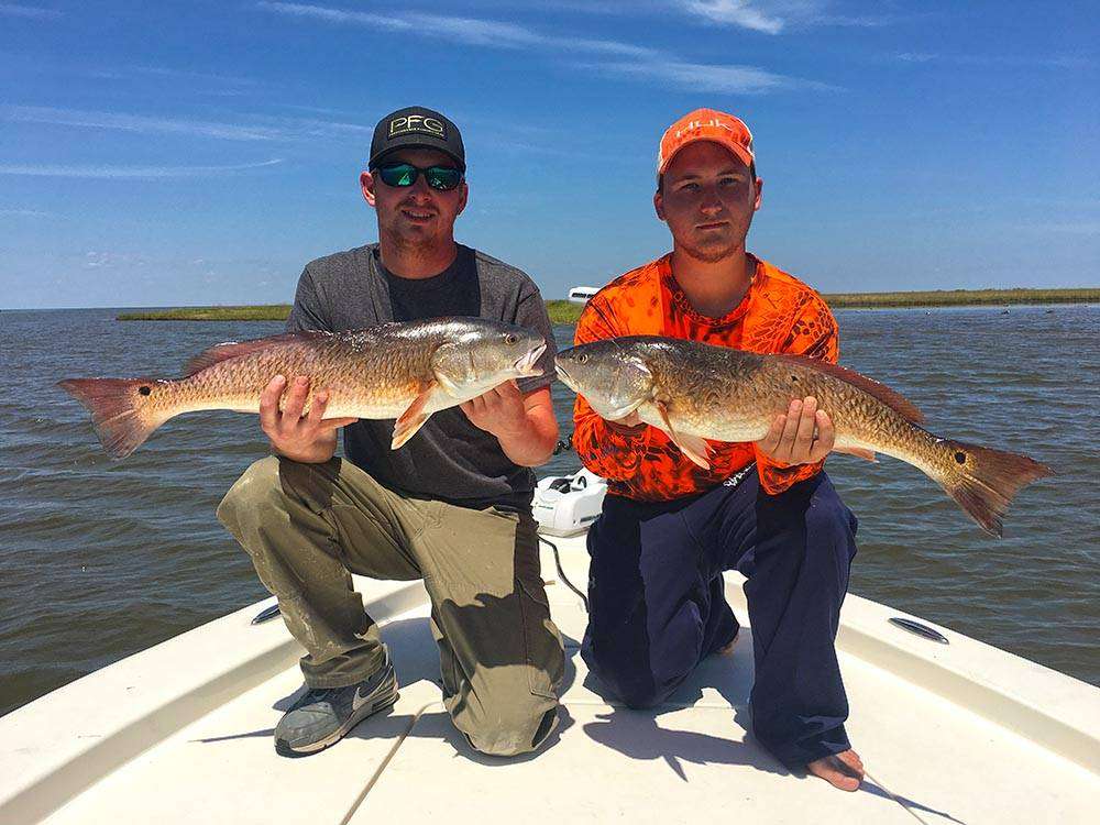 A picture of Come Fish Bull Reds In Gulfport with Legends of the Lower Marsh