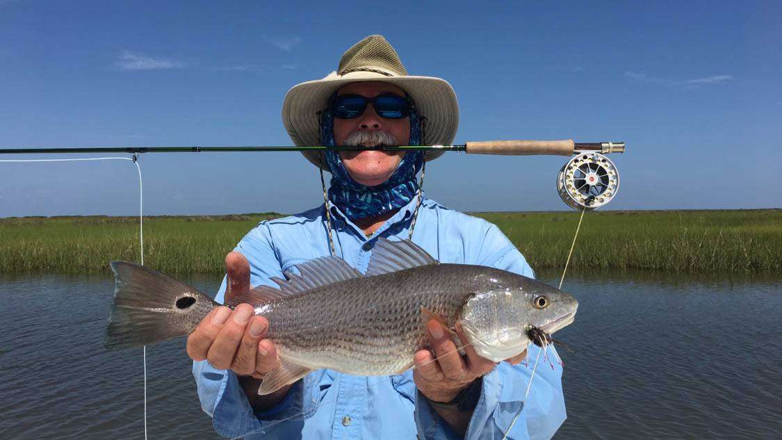 A picture of Marsh Fishing For Redfish with Legends of the Lower Marsh