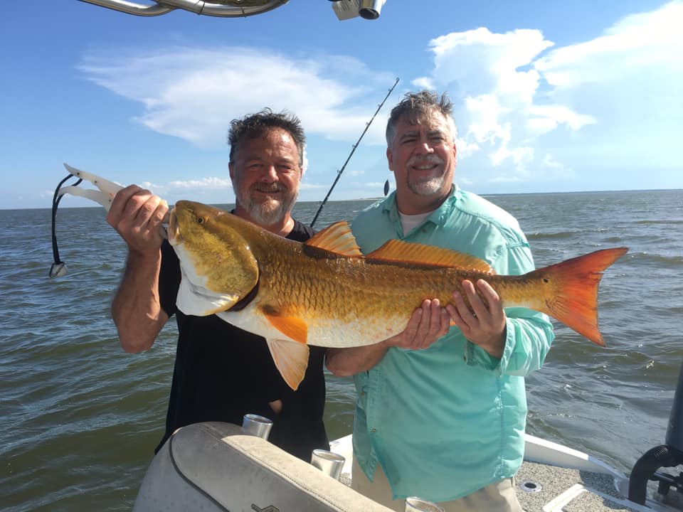 A picture of Fishing For Biloxi Marsh Redfish In Summer with Legends of the Lower Marsh