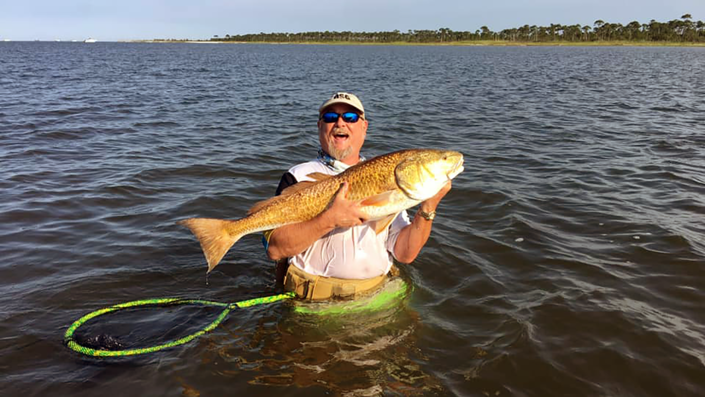 A picture of Finding Bull Redfish In The Biloxi Marsh with Legends of the Lower Marsh